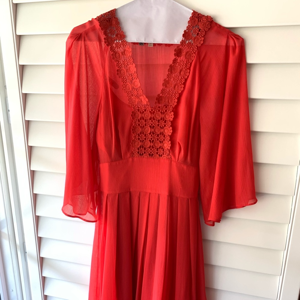 Orange flowy Gianni bini dress